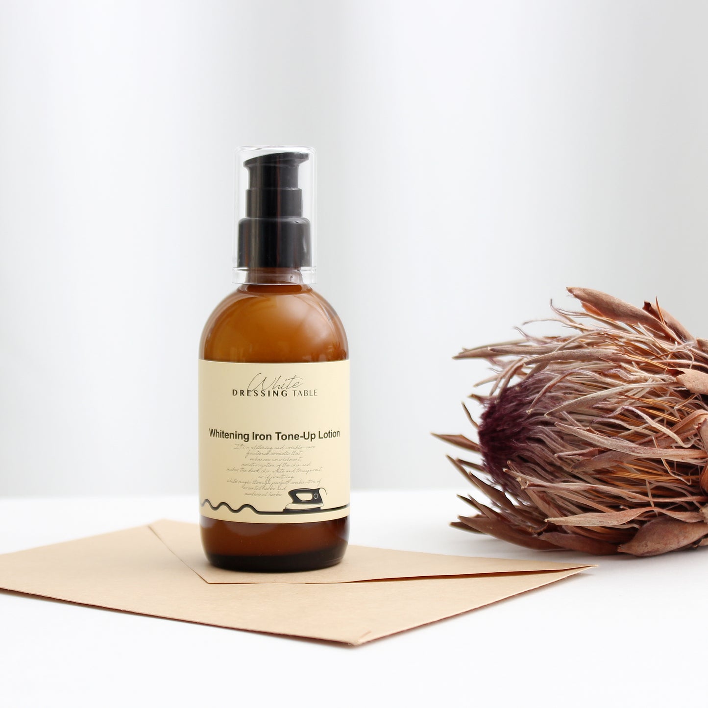 DRESSINGTABLE Brightening Iron Tone-Up Lotion in a bottle with natural elements, showcasing skincare benefits.