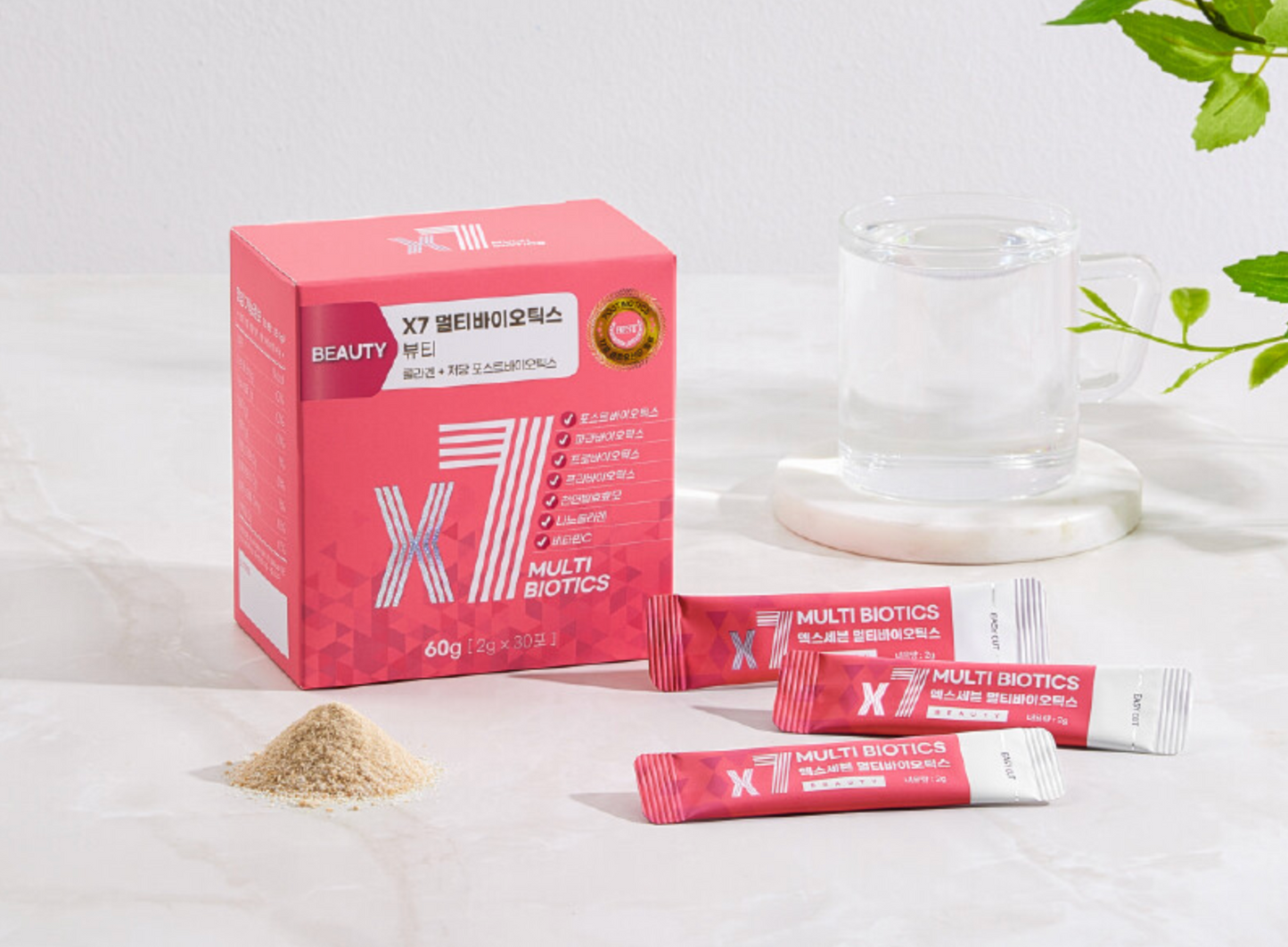 A box of X7 Multi Biotics Beauty with 30 stick packs, displayed alongside three opened sticks, a pile of powder, and a glass of water on a white surface.