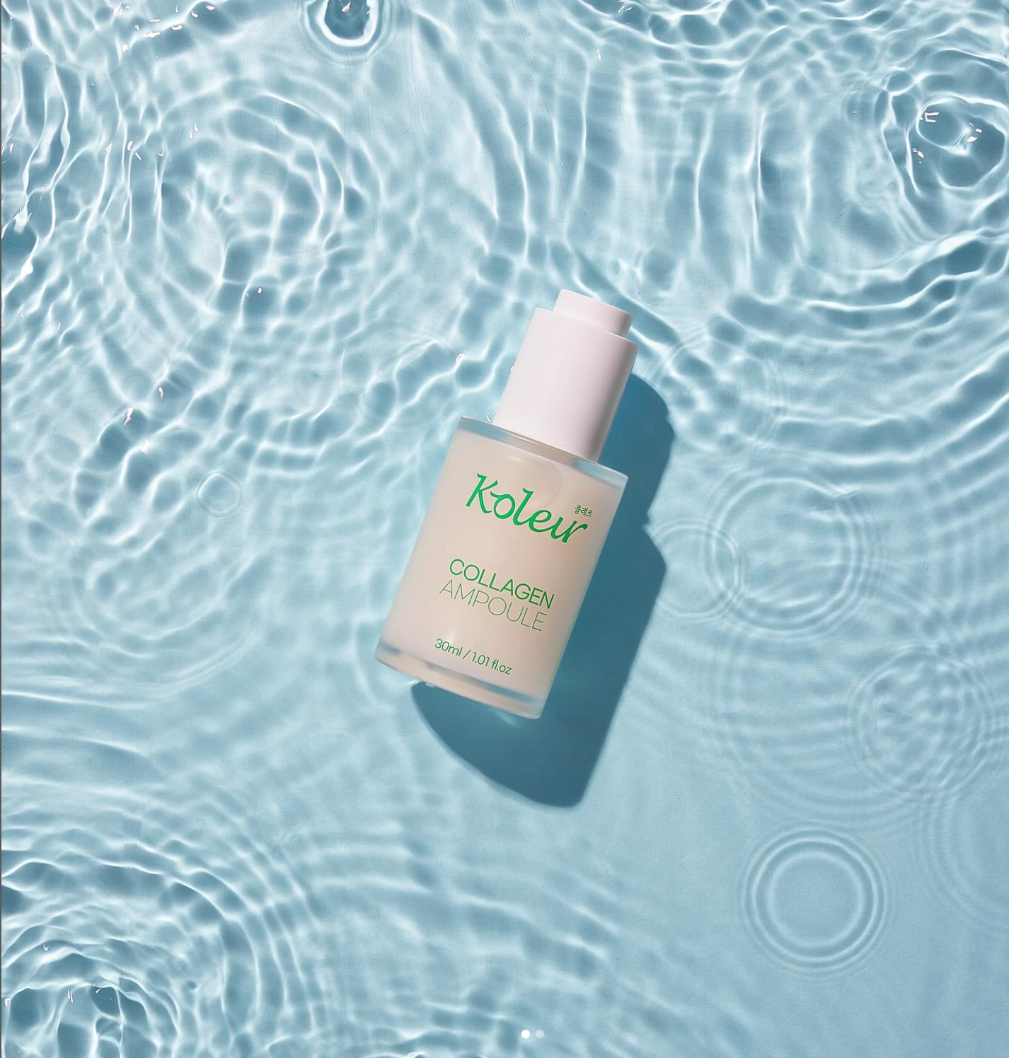 KOLEUR Collagen Ampoule bottle on water surface, showcasing its moisturizing and anti-aging benefits.
