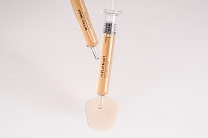 IN YOUR HEART Repair Booster Shot ampoules with rejuvenating serum for skin repair and elasticity.