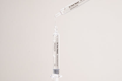 IN YOUR HEART Hydro Booster Shot in a dropper ready to deliver instant hydration and moisture.