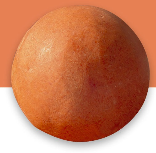 [Erigeron] All in One Vegan Beauty Ball Beet Ball shown in orange