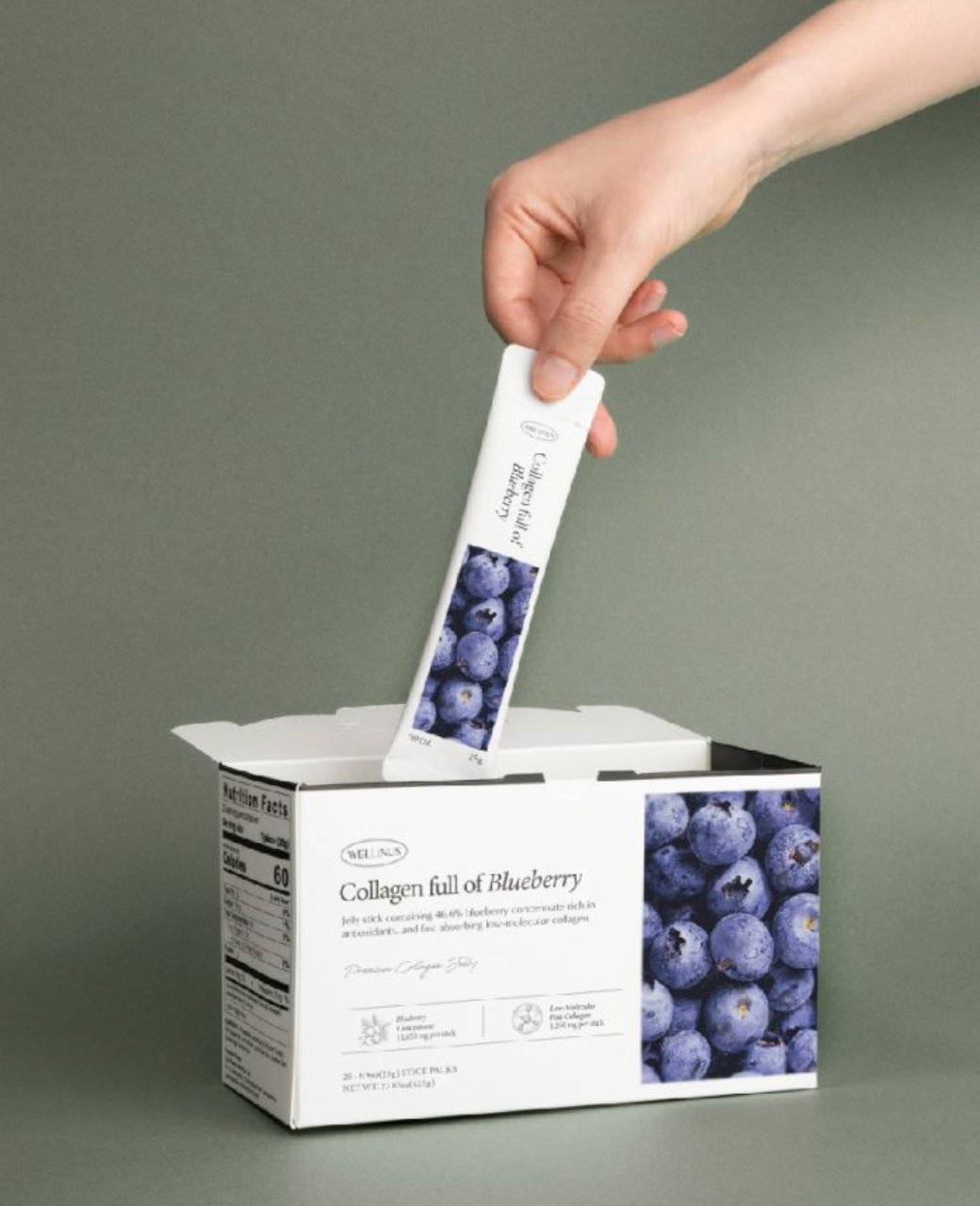 [Wellinus] Collagen Jelly in blueberry being pulled out of the package box